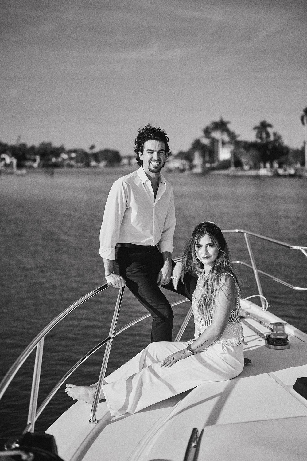 The two of them on the bow, the island behind