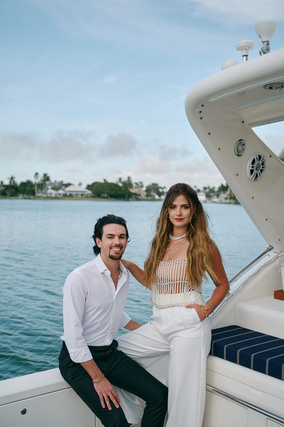 Relaxed together on the boat, the island beyond