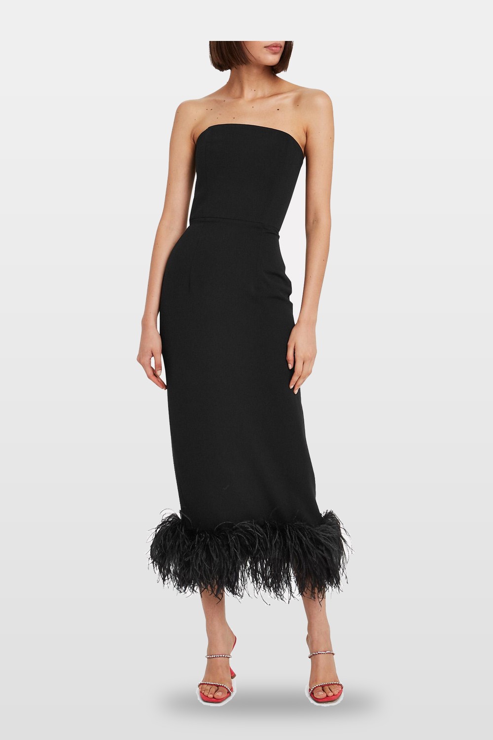 A strapless midi with a feather hem