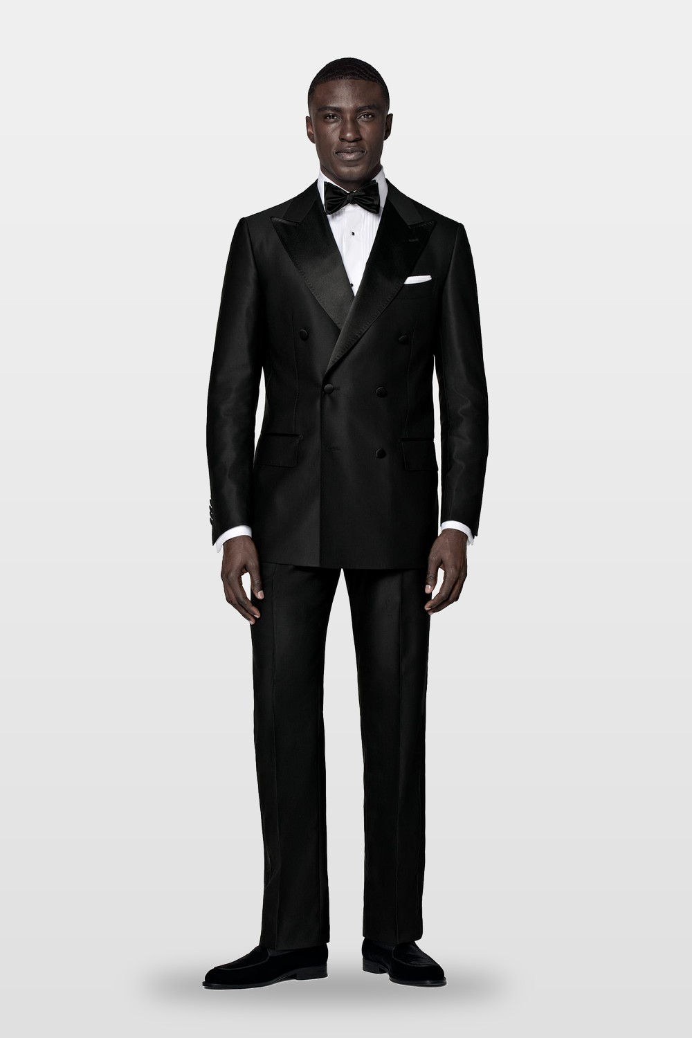 Black tie — a tuxedo with a white shirt